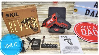 SKIL screwdriver shown with included bits, charger, manual, and packaging.